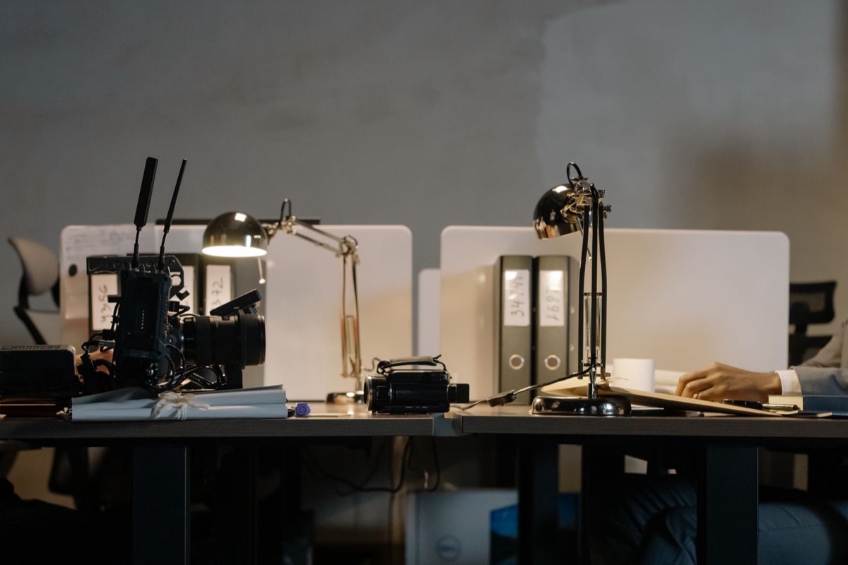Office desks with lamps and binders