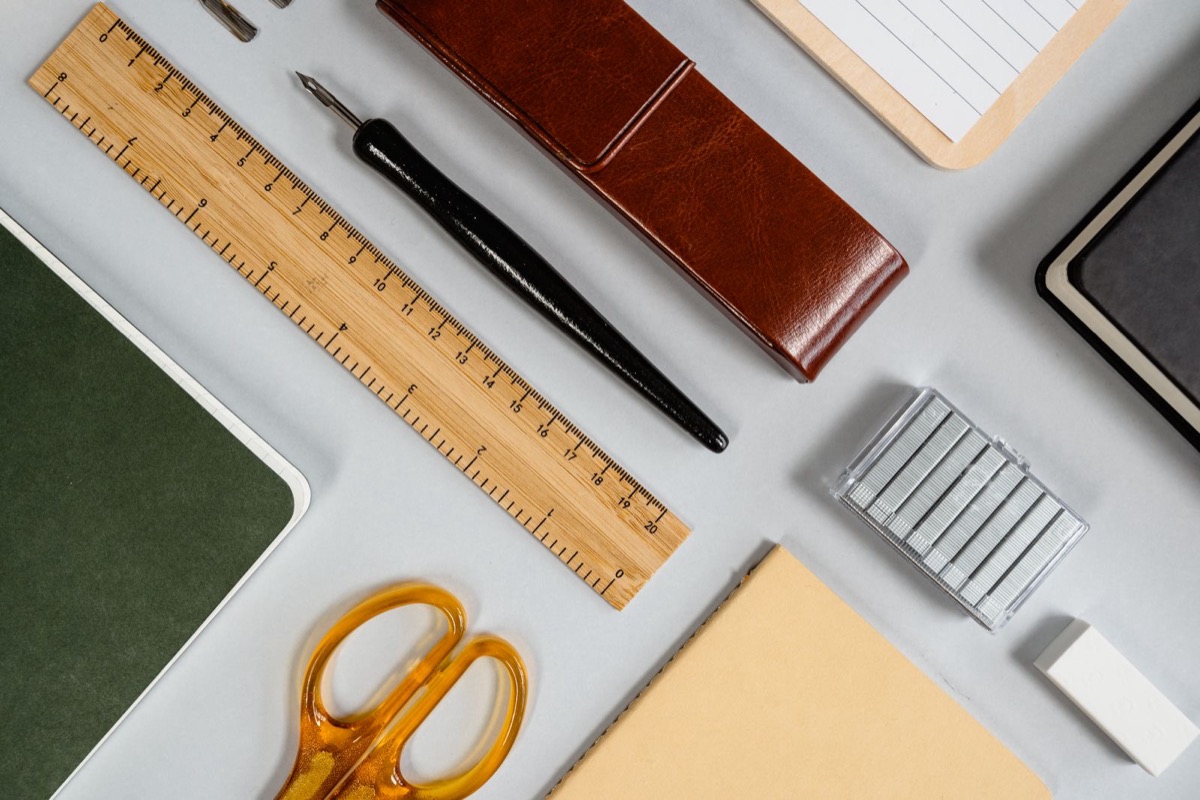 Stationery with a ruler, scissors and notebooks