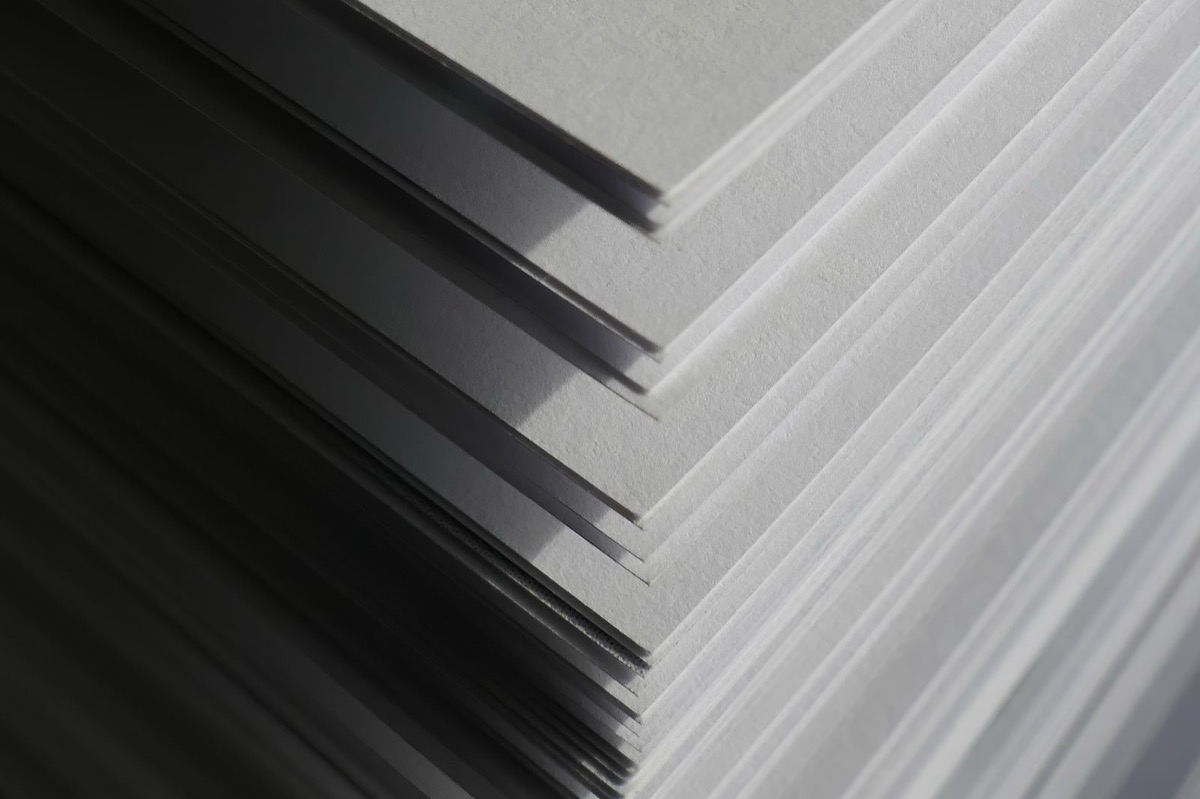 Stacked white paper sheets